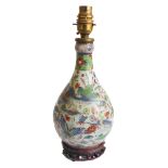 A 19th century Chinese porcelain 'garlic mouth' vase of baluster form: hand decorated in enamels