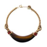 A French mid 20th century tiger's eye and coral bracelet by Chaumet, the curved tapering tiger's eye