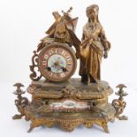 A late 19th century French gilt-metal figural mantle clock for restoration: porcelain dial with