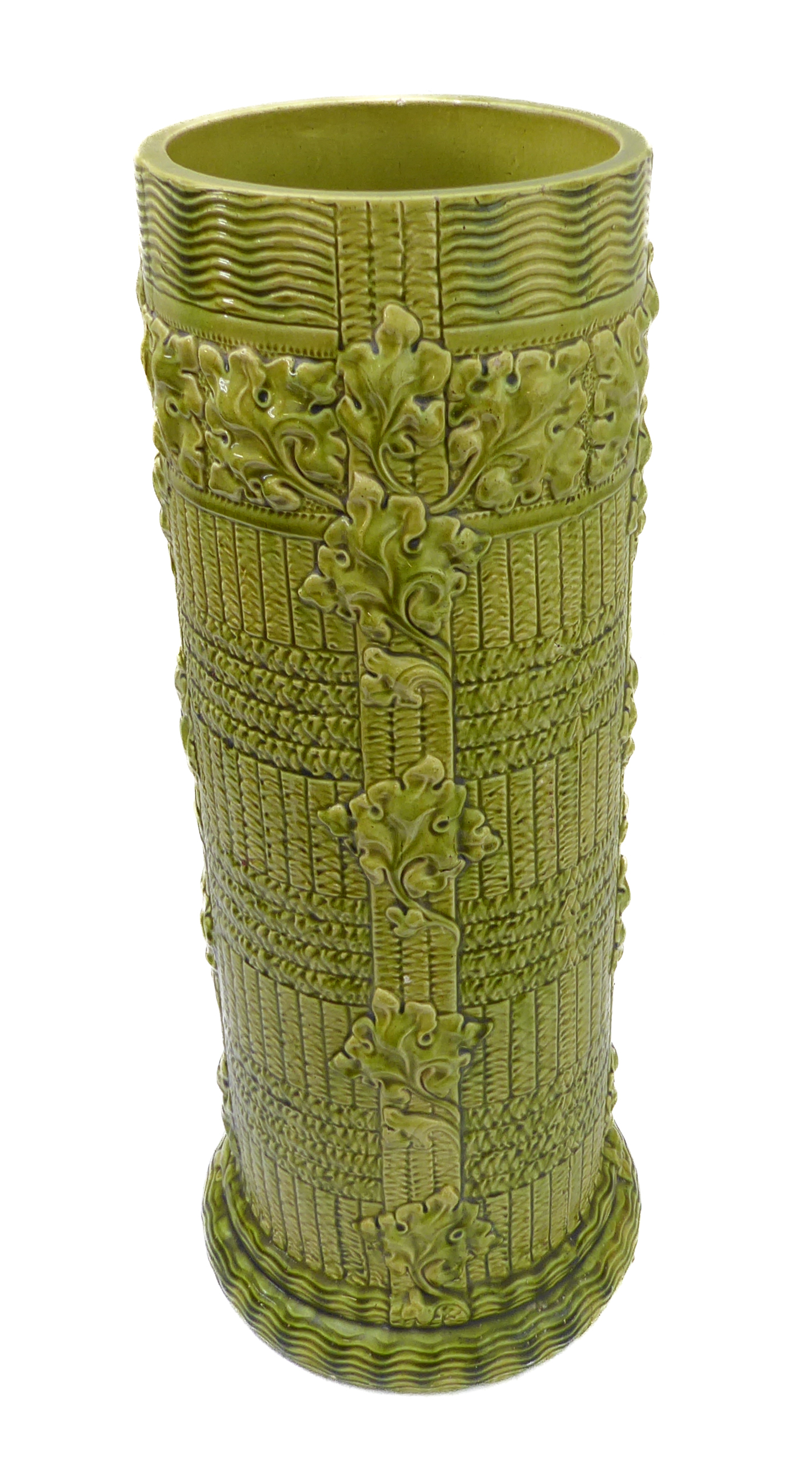 A large late 19th / early 20th century Burmantofts faience pottery umbrella stand: green-glazed