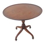 A George III style (probably 19th century) circular dish topped mahogany occasional table: tuned