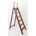 A flight of late 19th / early 20th century stained-pine housekeeper's steps by Simplex:  A-frame