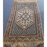 A modern Moroccan rug (thick pile); an ivory central hexagonal medallion surrounded by conforming