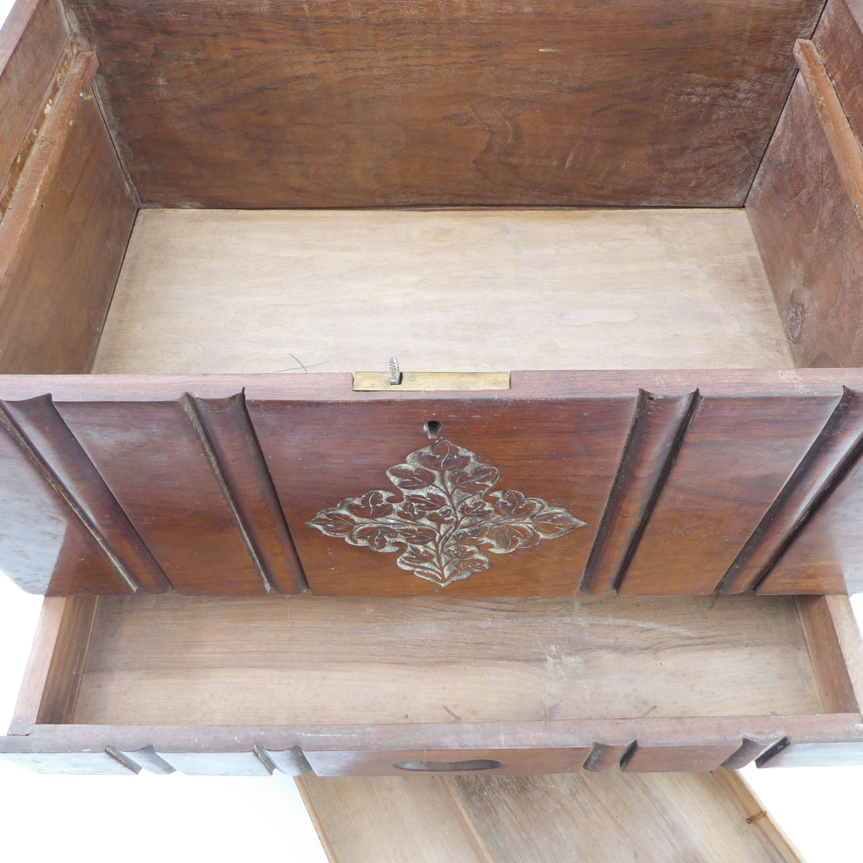 A small carved Eastern hardwood chest: the overhanging top above a pull-out top compartment - Image 3 of 5