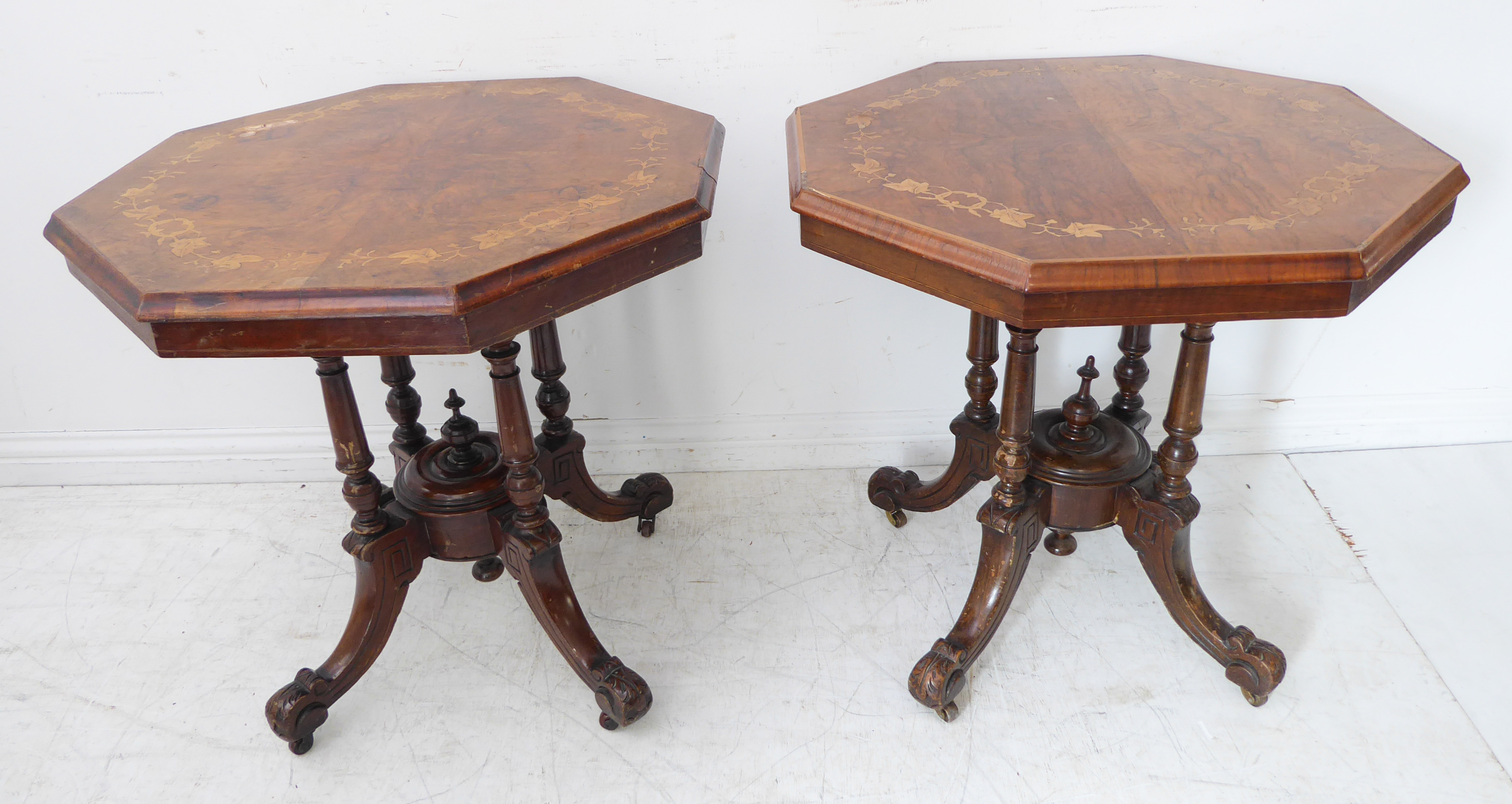 A pair of octagonal quarter-veneered walnut centre tables: each with laurel leaf style marquetry