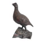 HAMISH MACKIE (British b. 1973) - a patinated bronze study of a grouse: signed 'HAM' to the rockwork