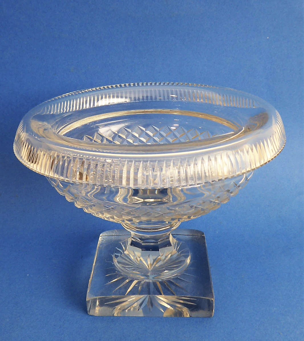 An early 19th century circular pedestal glass bowl: the averted, fluted lip above a hobnail-cut body - Image 2 of 5