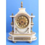 A 19th century marble and gilt-metal-mounted eight-day mantle clock: the broken arch style