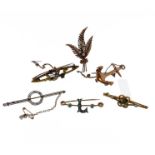 Six mostly late Victorian brooches: a 9-carat yellow gold fern spray brooch with seed pearl