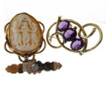 Three Victorian brooches in gold coloured mounts, comprising  a shell cameo, a three stone