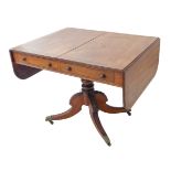 An early 19th century George IV period mahogany and rosewood crossbanded sofa table: two half-