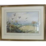 ROLAND GREEN - English partridge in flight over fields, watercolour, signed (11⅛in x 17⅛in, 29cm x