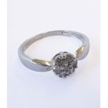 A 9-carat white gold and diamond cluster ring, ring size M