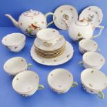 Herend 'Rothschild Bird': two teapots, a sugar bowl, a set of six teacups and saucer, and one larger