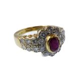 An 18-carat  gold, ruby and diamond cluster ring, ring size N/O