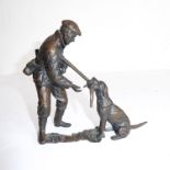 A modern limited edition (163 of 200) heavy bronze sculpture of a gun dog retrieving a pheasant to