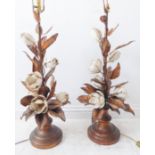 A large and showy pair of bronzed table lamps modelled as flowering shrubs, together with original
