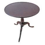 An antique circular dish-topped mahogany occasional / wine table; baluster turned stem and on