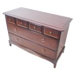 A Stag Minstrel mahogany chest: moulded top above four top drawers and two full-width drawers below,