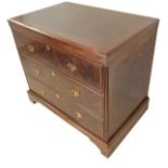 A walnut chest: figured walnut top above three full-width graduated crossbanded drawers and raised