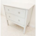 A painted two-drawer bedroom-style chest (76cm wide x 43.5cm deep x 76cm high)