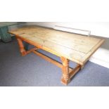 A good late 19th century natural pine farmhouse style table; the four-plank top with cleated ends