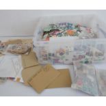 A large quantity of world stamps, off paper, some mint, mainly used including cinderellas. Many