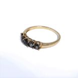 A 9-carat gold five-stone ring, possibly topaz, ring size S (boxed)