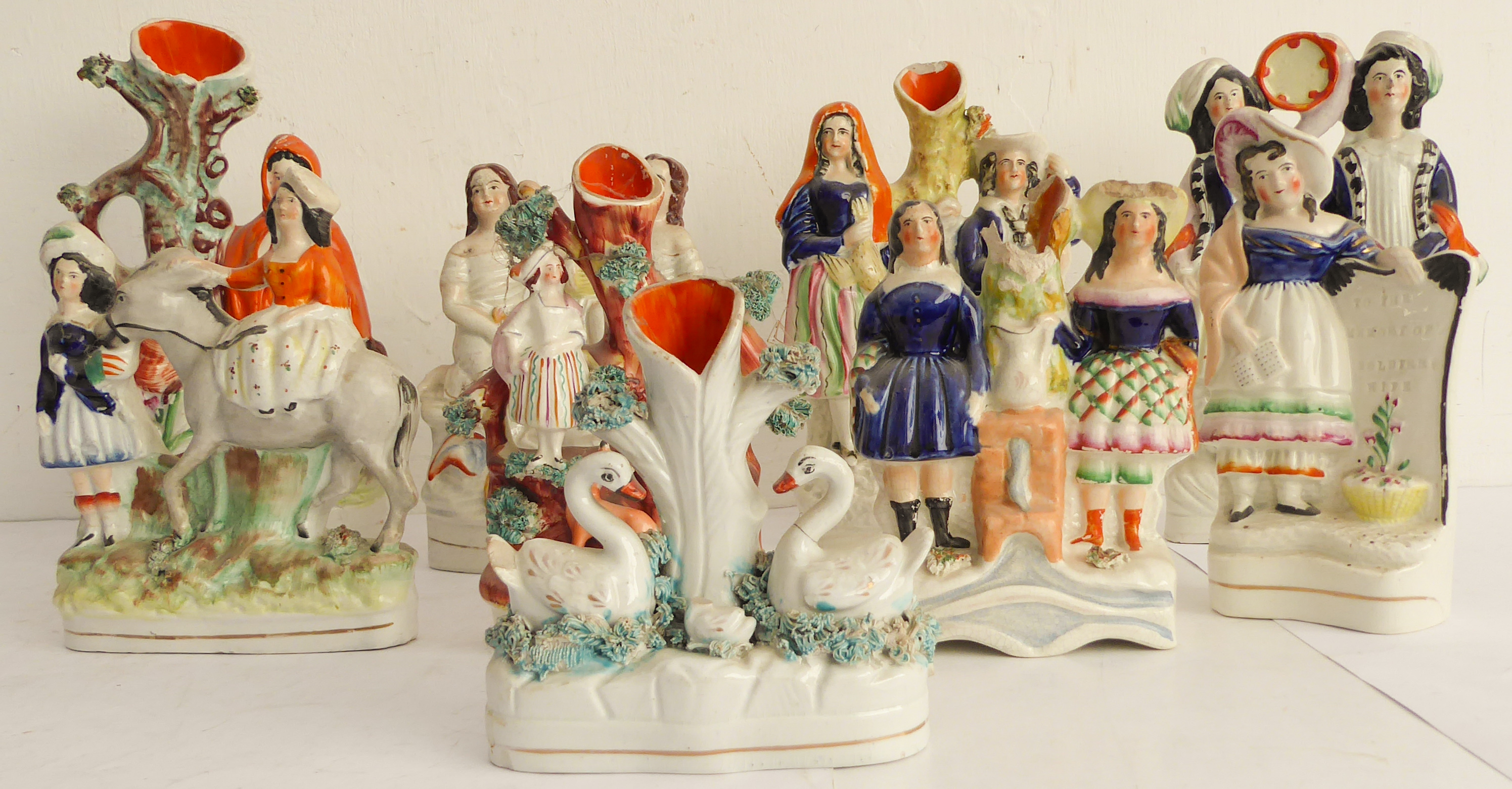 Nine 19th century hand-decorated flatback figures to include musicians, seafood sellers, a spill - Image 2 of 11