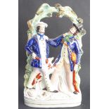 A large 19th century Staffordshire flatback figure, 'Poacher and Squire Fighting' (35cm high)