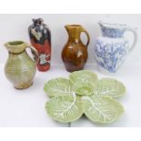 A group of five ceramic pieces comprising: an Edwardian Doulton Burslem blue-and-white ceramic jug