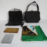 A small selection to include two Art Deco style evening bags, a black-leather evening bag, a