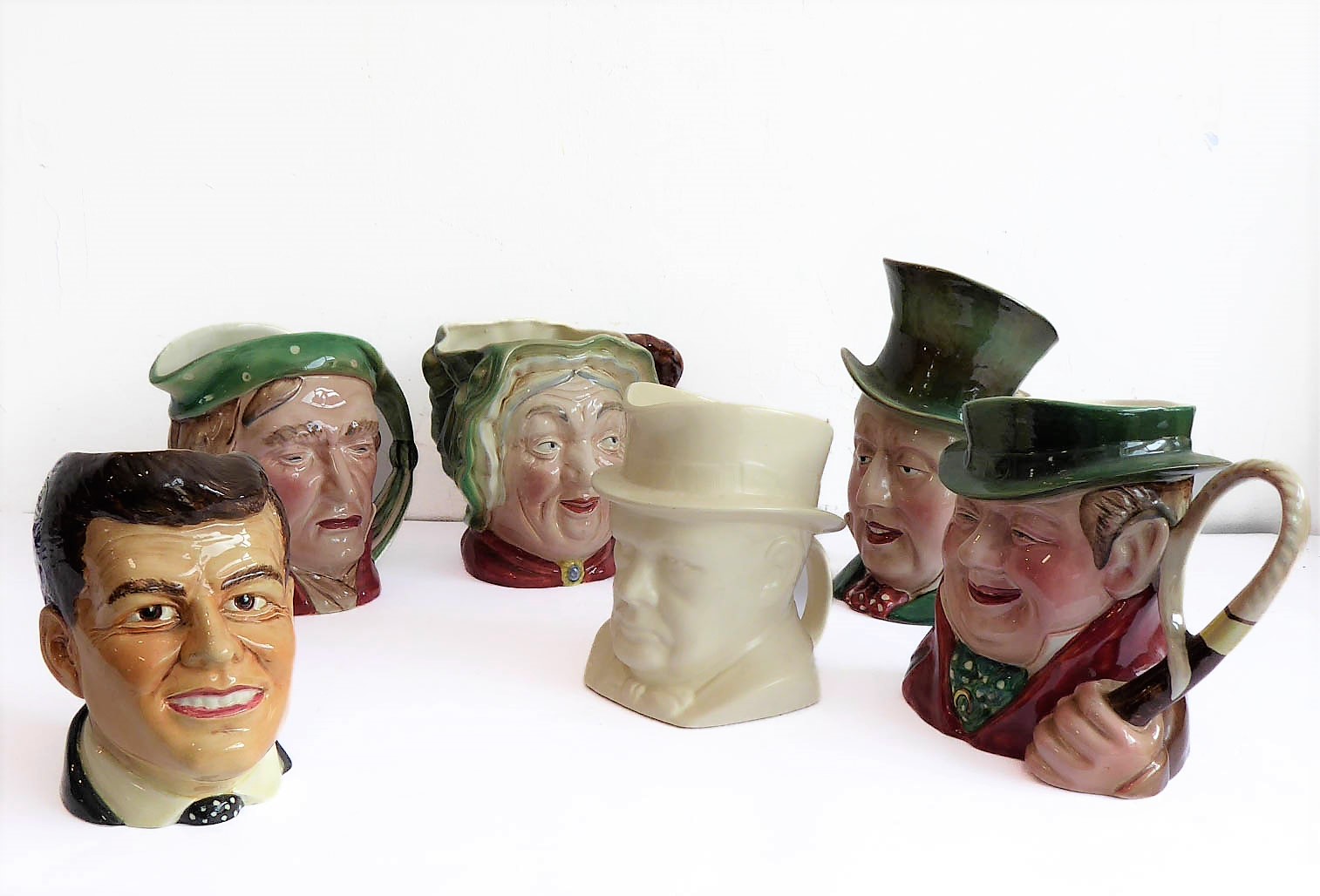 Six Toby jugs: Winston Churchill 1941 modelled by Frank Potts for J & E Meakin; John F Kennedy by