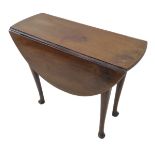 An 18th century oval mahogany drop-leaf table of small proportions on turned legs terminating in pad