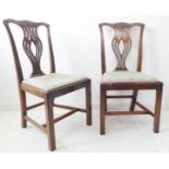 A pair of 18th century style (later) mahogany salon chairs; each with shaped top rail carved with