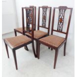 A set of four early 20th century mahogany and satinwood crossbanded chairs: square tapering