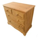 A modern pine chest in 19th century style: thumbnail moulded top above two half-width and two full-