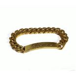 A very heavy gold-plated silver ID bracelet