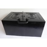 An interesting and unusual 19th century black-painted cast-iron strongbox; two side carrying handles