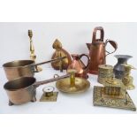 An interesting assortment to include: two three-legged brass skillets (12.5 and 17.5 cm in