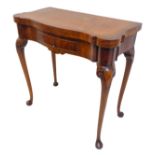A good early 20th century figured walnut veneered foldover top card table in early 18th century