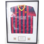 A very rare Barcelona football shirt signed by the team; Dri-fit shirt with sewn badges above