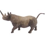 An unusual Coalport bone china model of a twin-horned rhinoceros (28.5cm long including tail)
