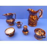 A small selection of 19th and early 20th century Welsh copper lustre to include jugs, a mustard,