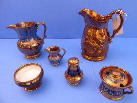 A small selection of 19th and early 20th century Welsh copper lustre to include jugs, a mustard,