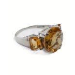 A 10-carat gold ring set with citrines, ring size N