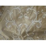 A pair of Colefax & Fowler curtains in champagne silk decorated with machine embroidery; goblet