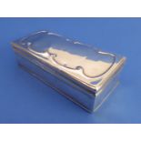 A hallmarked silver box and hinged cover: the slightly domed cover decorated with continuous C-