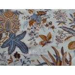 A pair of curtains in heavy coated cotton with a design of exotic flowers, leaves and fruit and a