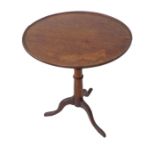 A late 18th/19th century circular tilt-top mahogany occasional table with fruitwood stem and